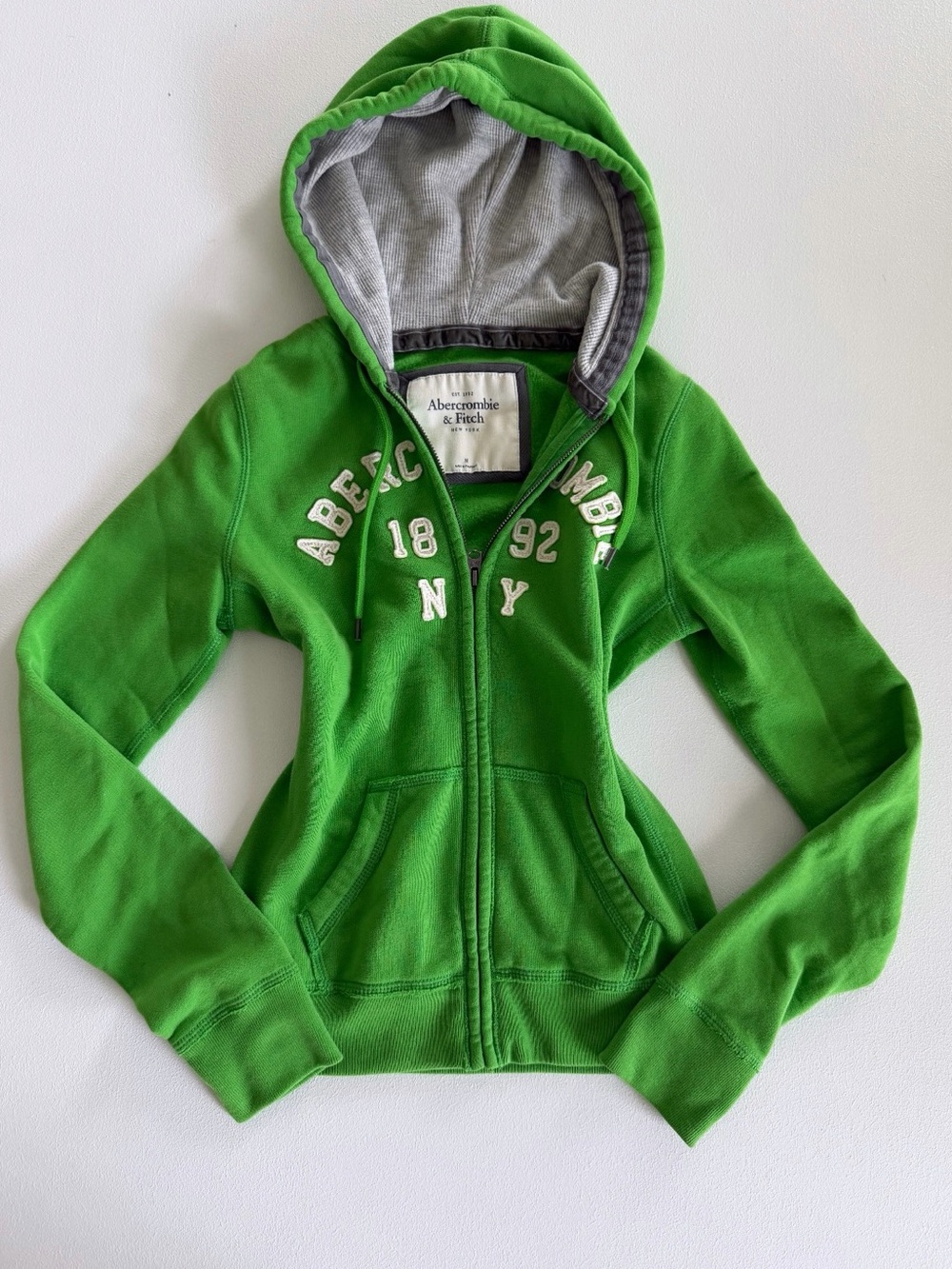 Vintage Abercrombie & Fitch Green Zip-Up
Hoodie Graphic Y2K Size M